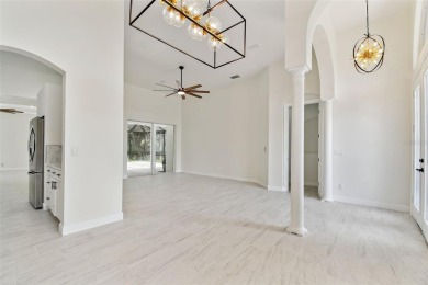 Welcome to 13792 Long Lake, a fully remodeled luxury residence on Riverwood Golf Club in Florida - for sale on GolfHomes.com, golf home, golf lot