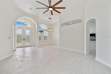 Welcome to 13792 Long Lake, a fully remodeled luxury residence on Riverwood Golf Club in Florida - for sale on GolfHomes.com, golf home, golf lot