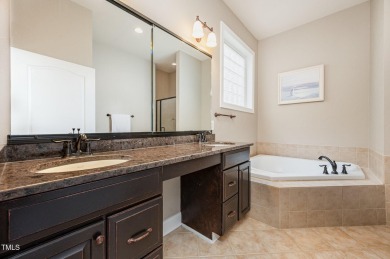 Welcome to this beautifully maintained brick-front home nestled on Brier Creek Country Club in North Carolina - for sale on GolfHomes.com, golf home, golf lot