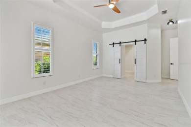 Welcome to 13792 Long Lake, a fully remodeled luxury residence on Riverwood Golf Club in Florida - for sale on GolfHomes.com, golf home, golf lot