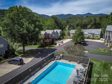 You must see this light-filled, two-story end unit condo at The on Black Mountain Golf Course in North Carolina - for sale on GolfHomes.com, golf home, golf lot