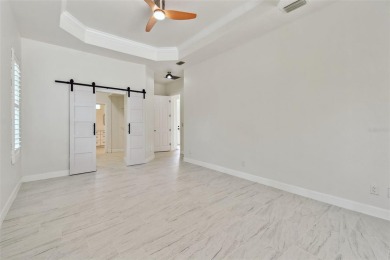 Welcome to 13792 Long Lake, a fully remodeled luxury residence on Riverwood Golf Club in Florida - for sale on GolfHomes.com, golf home, golf lot