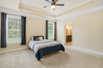 Welcome to 137 Golden Eagle Lane, where comfort meets elegance on Cobbs Glen Country Club in South Carolina - for sale on GolfHomes.com, golf home, golf lot