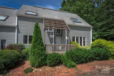 You must see this light-filled, two-story end unit condo at The on Black Mountain Golf Course in North Carolina - for sale on GolfHomes.com, golf home, golf lot