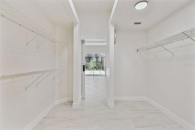 Welcome to 13792 Long Lake, a fully remodeled luxury residence on Riverwood Golf Club in Florida - for sale on GolfHomes.com, golf home, golf lot