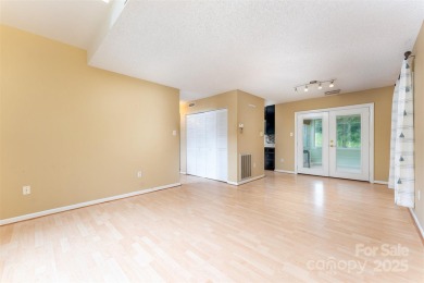 You must see this light-filled, two-story end unit condo at The on Black Mountain Golf Course in North Carolina - for sale on GolfHomes.com, golf home, golf lot