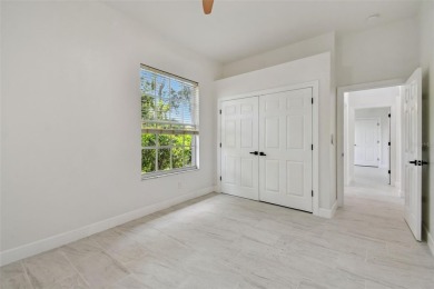 Welcome to 13792 Long Lake, a fully remodeled luxury residence on Riverwood Golf Club in Florida - for sale on GolfHomes.com, golf home, golf lot