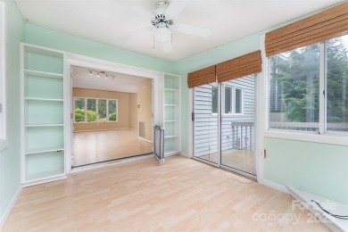 You must see this light-filled, two-story end unit condo at The on Black Mountain Golf Course in North Carolina - for sale on GolfHomes.com, golf home, golf lot