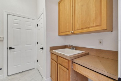 Welcome to 13792 Long Lake, a fully remodeled luxury residence on Riverwood Golf Club in Florida - for sale on GolfHomes.com, golf home, golf lot