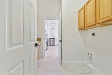 Welcome to 13792 Long Lake, a fully remodeled luxury residence on Riverwood Golf Club in Florida - for sale on GolfHomes.com, golf home, golf lot