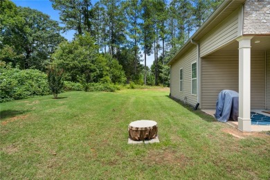 Welcome to 137 Golden Eagle Lane, where comfort meets elegance on Cobbs Glen Country Club in South Carolina - for sale on GolfHomes.com, golf home, golf lot