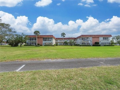 THIS MUST BE THE PLACE! Opportunity knocks at this top floor on The American Golf Club in Florida - for sale on GolfHomes.com, golf home, golf lot