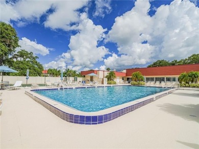 THIS MUST BE THE PLACE! Opportunity knocks at this top floor on The American Golf Club in Florida - for sale on GolfHomes.com, golf home, golf lot