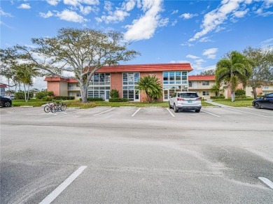 THIS MUST BE THE PLACE! Opportunity knocks at this top floor on The American Golf Club in Florida - for sale on GolfHomes.com, golf home, golf lot