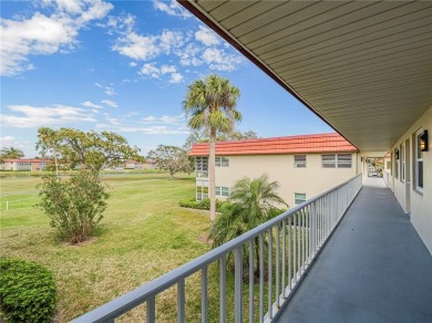 THIS MUST BE THE PLACE! Opportunity knocks at this top floor on The American Golf Club in Florida - for sale on GolfHomes.com, golf home, golf lot