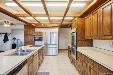 Discover the potential of this spacious ranch-style home on a on Heritage Eagle Bend Golf and Country Club in Colorado - for sale on GolfHomes.com, golf home, golf lot