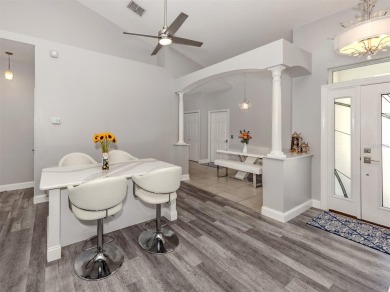 A charming three-bedroom, two-bath, desirable two-car side entry on The River Club in Florida - for sale on GolfHomes.com, golf home, golf lot