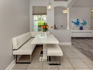 A charming three-bedroom, two-bath, desirable two-car side entry on The River Club in Florida - for sale on GolfHomes.com, golf home, golf lot