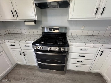 Discover this dream home in the charming guard-gated golf course on Los Prados Golf Course in Nevada - for sale on GolfHomes.com, golf home, golf lot