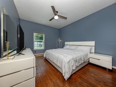 A charming three-bedroom, two-bath, desirable two-car side entry on The River Club in Florida - for sale on GolfHomes.com, golf home, golf lot