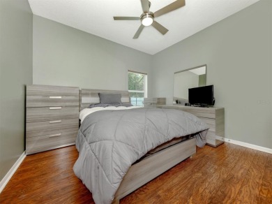 A charming three-bedroom, two-bath, desirable two-car side entry on The River Club in Florida - for sale on GolfHomes.com, golf home, golf lot