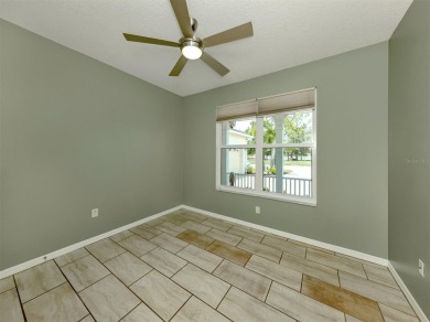 A charming three-bedroom, two-bath, desirable two-car side entry on The River Club in Florida - for sale on GolfHomes.com, golf home, golf lot