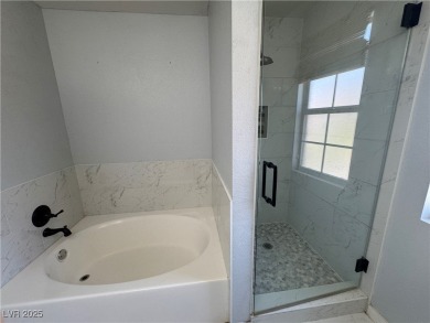 Discover this dream home in the charming guard-gated golf course on Los Prados Golf Course in Nevada - for sale on GolfHomes.com, golf home, golf lot