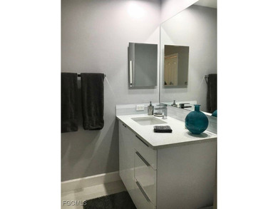 Beachy Charm Meets Modern Style in Heritage Palms! This updated on Heritage Palms Golf and Country Club in Florida - for sale on GolfHomes.com, golf home, golf lot