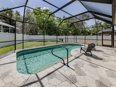 A charming three-bedroom, two-bath, desirable two-car side entry on The River Club in Florida - for sale on GolfHomes.com, golf home, golf lot