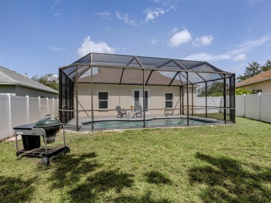 A charming three-bedroom, two-bath, desirable two-car side entry on The River Club in Florida - for sale on GolfHomes.com, golf home, golf lot