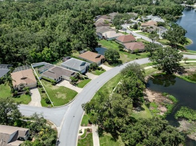 A charming three-bedroom, two-bath, desirable two-car side entry on The River Club in Florida - for sale on GolfHomes.com, golf home, golf lot