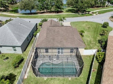 A charming three-bedroom, two-bath, desirable two-car side entry on The River Club in Florida - for sale on GolfHomes.com, golf home, golf lot
