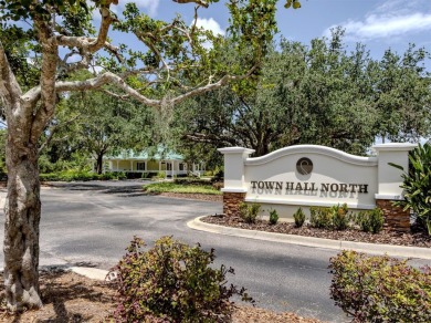 A charming three-bedroom, two-bath, desirable two-car side entry on The River Club in Florida - for sale on GolfHomes.com, golf home, golf lot