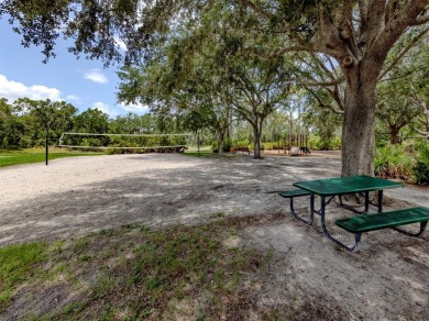 A charming three-bedroom, two-bath, desirable two-car side entry on The River Club in Florida - for sale on GolfHomes.com, golf home, golf lot
