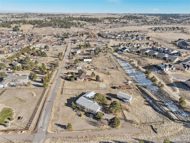 Discover the potential of this spacious ranch-style home on a on Heritage Eagle Bend Golf and Country Club in Colorado - for sale on GolfHomes.com, golf home, golf lot