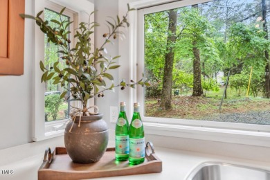 Discover your tranquil retreat in this stylish 3-bedroom on Twin Lakes Golf Course in North Carolina - for sale on GolfHomes.com, golf home, golf lot