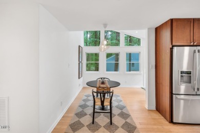 Discover your tranquil retreat in this stylish 3-bedroom on Twin Lakes Golf Course in North Carolina - for sale on GolfHomes.com, golf home, golf lot