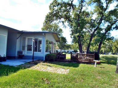 Rolling Greens Village is a friendly resort-style 55+ community on Rolling Greens Executive Golf Community in Florida - for sale on GolfHomes.com, golf home, golf lot