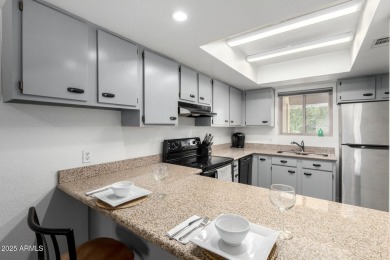 Live in the heart of it all--this updated condo sits in cozy on Stonecreek Golf Club in Arizona - for sale on GolfHomes.com, golf home, golf lot