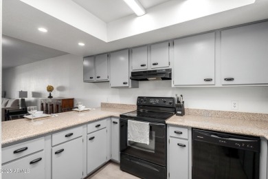 Live in the heart of it all--this updated condo sits in cozy on Stonecreek Golf Club in Arizona - for sale on GolfHomes.com, golf home, golf lot