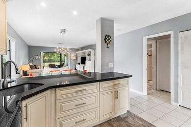 Enjoy sweeping South Course views from this renovated on Hunters Run Golf and Country Club in Florida - for sale on GolfHomes.com, golf home, golf lot