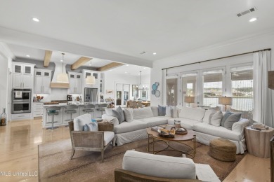 Welcome to 121 Camden Lane - a dreamy waterfront retreat!  This on Lake Caroline Golf Club in Mississippi - for sale on GolfHomes.com, golf home, golf lot