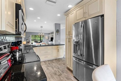 Enjoy sweeping South Course views from this renovated on Hunters Run Golf and Country Club in Florida - for sale on GolfHomes.com, golf home, golf lot