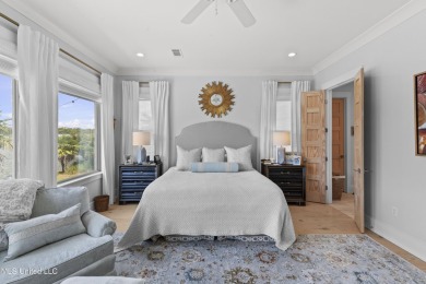 Welcome to 121 Camden Lane - a dreamy waterfront retreat!  This on Lake Caroline Golf Club in Mississippi - for sale on GolfHomes.com, golf home, golf lot