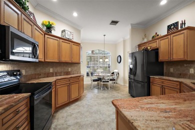 Welcome to this STUNNING 3/2 TURNKEY (including golf cart!) on The Links of Spruce Creek in Florida - for sale on GolfHomes.com, golf home, golf lot