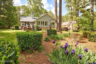 This immaculate home is situated on the Fairway of the 8th hole on Seven Lakes Country Club in North Carolina - for sale on GolfHomes.com, golf home, golf lot