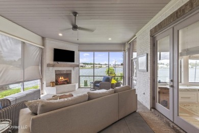 Welcome to 121 Camden Lane - a dreamy waterfront retreat!  This on Lake Caroline Golf Club in Mississippi - for sale on GolfHomes.com, golf home, golf lot