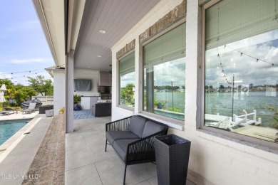 Welcome to 121 Camden Lane - a dreamy waterfront retreat!  This on Lake Caroline Golf Club in Mississippi - for sale on GolfHomes.com, golf home, golf lot