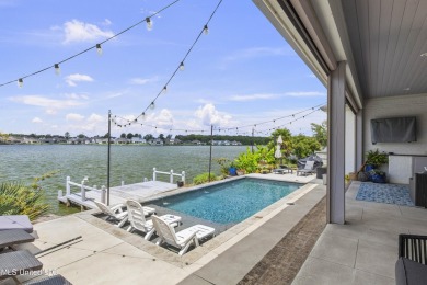 Welcome to 121 Camden Lane - a dreamy waterfront retreat!  This on Lake Caroline Golf Club in Mississippi - for sale on GolfHomes.com, golf home, golf lot