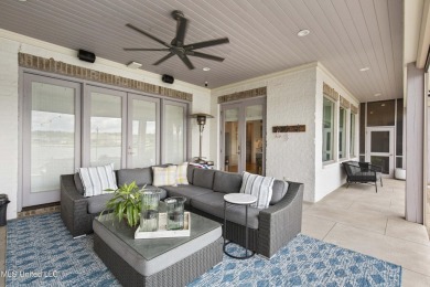 Welcome to 121 Camden Lane - a dreamy waterfront retreat!  This on Lake Caroline Golf Club in Mississippi - for sale on GolfHomes.com, golf home, golf lot